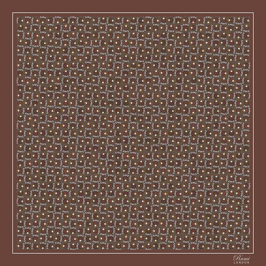 Square silk scarf featuring repeat motif conchs on a brown base with 'Rumi London' branding on its border.