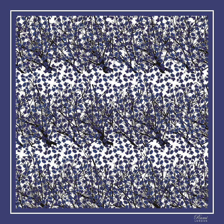 Pattern of scattered blue poppies and black branches on a white background with a blue border.